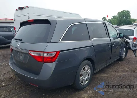 2012 Honda Odyssey Lx z USA, uszkodzony, nr VIN 5FNRL5H21CB147208